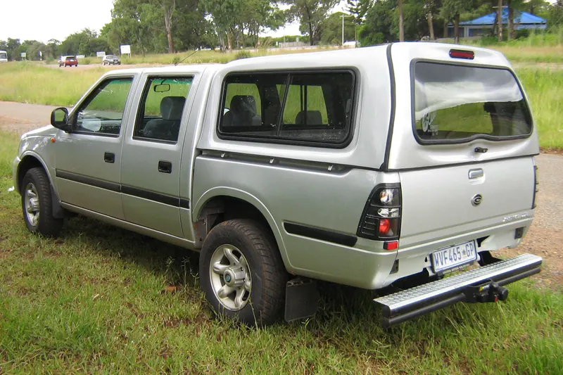 Silver GoNow double cab with a colour-matched canopy.