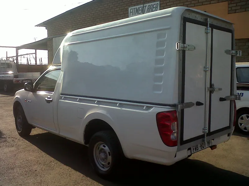 White GWM single cab with a Space Saver canopy and double rear doors.